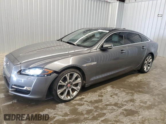 2019 Jaguar XJ Portfolio with VIN SAJWA2G71K8W19797, listed as a Copart auction lot 54133195 with 57,446 mi miles and Salvage Title. Bid and sale history available at DreamBid. Image 1.