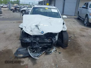 2006 BMW 3 Series 325xi with VIN WBAVD13556KV10507, listed as a IAAI auction lot 42515516 with 159,034 mi miles and . Bid and sale history available at DreamBid. Image 12.