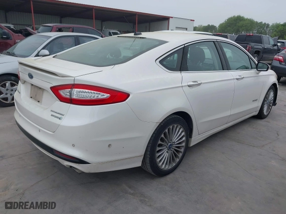 2014 Ford Fusion Titanium Hybrid with VIN 3FA6P0RU6ER115985, listed as a IAAI auction lot 41870494 with 132,321 mi miles. Bid and sale history available at carsss.com. Image 4.