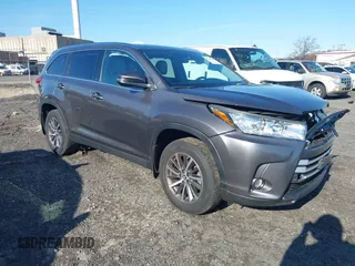 2019 Toyota Highlander SE with VIN 5TDJZRFH4KS715827, listed as a IAAI auction lot 40942304 with 23,451 mi miles and . Bid and sale history available at DreamBid. Image 1.