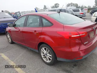 2016 Ford Focus SE with VIN 1FADP3F28GL254321, listed as a IAAI auction lot 42158144 with 89,807 mi miles. Bid and sale history available at carsss.com. Image 3.