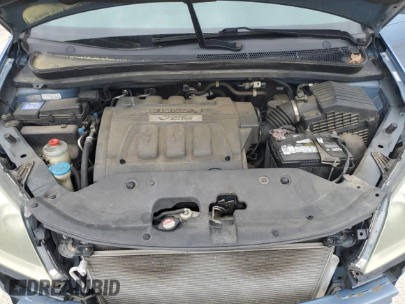 2008 Honda Odyssey EX-L z VIN 5FNRL38718B062201, wystawiony jako Copart lot #55942455 z przebiegiem 215 272 mil mil oraz Szkoda całkowita • Salvage title. Historia ofert i sprzedaży dostępna na DreamBid. Obrazek 12.