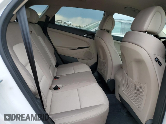 2018 Hyundai Tucson SEL with VIN KM8J3CA4XJU617796, listed as a Copart auction lot 60863885 with 57,995 mi miles and Clean title. Bid and sale history available at DreamBid. Image 11.