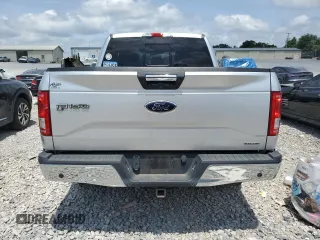 2015 Ford F-150 XL with VIN 1FTEW1CF3FFA48558, listed as a Copart auction lot 62067385 with 151,014 mi miles and Salvage title. Bid and sale history available at DreamBid. Image 6.