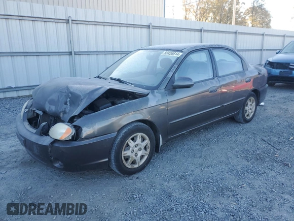 2003 Kia Spectra with VIN KNAFB121235248271, listed as a Copart auction lot 82426614 with 151,347 mi miles and Salvage Title. Bid and sale history available at DreamBid. Image 1.