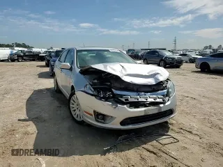 2010 Ford Fusion Hybrid with VIN 3FADP0L32AR308054, listed as a Copart auction lot 46930305 with 77,084 mi miles and Clean Title. Bid and sale history available at carsss.com. Image 11.