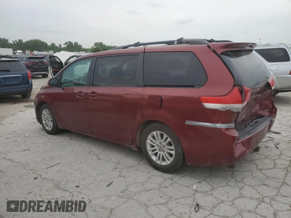 2011 Toyota Sienna XLE AAS with VIN 5TDYK3DC1BS140593, listed as a Copart auction lot 60745595 with 447,394 mi miles and Salvage title. Bid and sale history available at DreamBid. Image 2.