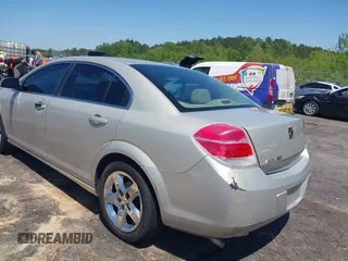2009 Saturn Aura XE with VIN 1G8ZS57BX9F208557, listed as a IAAI auction lot 42043106 with 152,530 mi miles and . Bid and sale history available at DreamBid. Image 3.