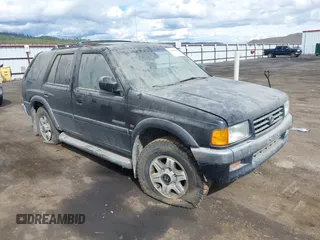 1996 Honda Passport z VIN 4S6CM58V7T4413421, wystawiony jako IAAI lot #41870561 z przebiegiem 221 905 mil mil oraz . Historia ofert i sprzedaży dostępna na DreamBid. Obrazek 1.