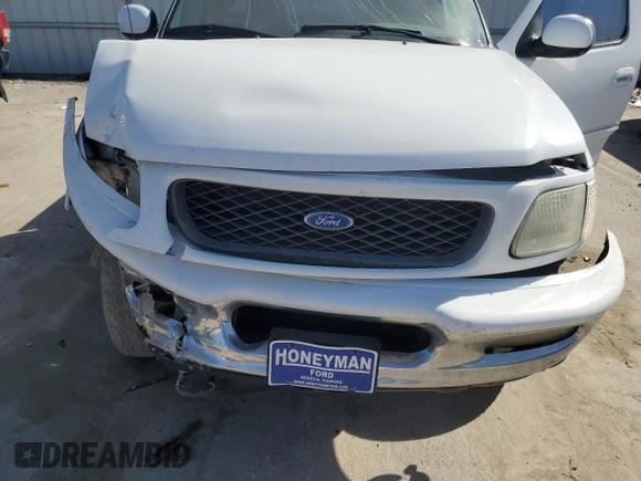 1997 Ford F-150 с VIN 1FTDF18W8VKC62309, выставлен на аукционе Copart как лот 48137745 с пробегом 156 917 миль миль и Списание • Salvage title. История ставок и продаж доступна на DreamBid. Изображение 12.