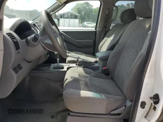 2009 Nissan Frontier SE with VIN 1N6AD07U19C411546, listed as a Copart auction lot 57683625 with 216,492 mi miles and Salvage title. Bid and sale history available at DreamBid. Image 7.