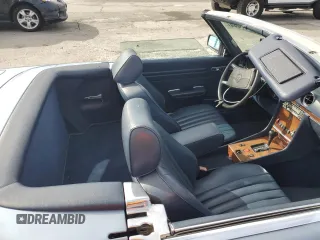 1988 Mercedes-Benz 560 SL with VIN WDBBA48D8JA090190, listed as a Copart auction lot 85241444 with 197,013 mi miles and Salvage Title. Bid and sale history available at carsss.com. Image 10.