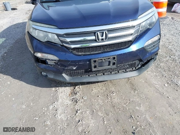2017 Honda Pilot EX-L with VIN 5FNYF5H52HB031634, listed as a IAAI auction lot 41145133 with 164,668 mi miles. Bid and sale history available at carsss.com. Image 6.