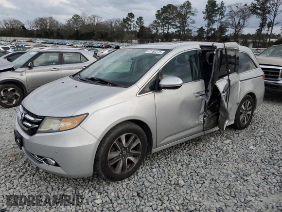 2014 Honda Odyssey Touring with VIN 5FNRL5H90EB096137, listed as a Copart auction lot 47192275 with 164,620 mi miles and Salvage Title. Bid and sale history available at DreamBid. Image 1.