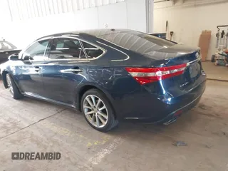 2014 Toyota Avalon Limited with VIN 4T1BK1EB1EU128987, listed as a IAAI auction lot 42034677 with 104,153 mi miles and . Bid and sale history available at DreamBid. Image 3.