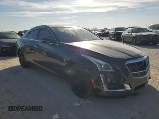 2014 Cadillac CTS Premium AWD с VIN 1G6AZ5S35E0159783, выставлен на аукционе Copart как лот 87081994 с пробегом 116 972 миль миль и Списание • Salvage title. История ставок и продаж доступна на DreamBid. Изображение 4.