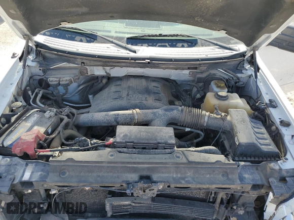 2014 Ford F-150 XL with VIN 1FTNF1ET7EKD39895, listed as a Copart auction lot 73953064 with 271,226 mi miles and Salvage title. Bid and sale history available at DreamBid. Image 11.