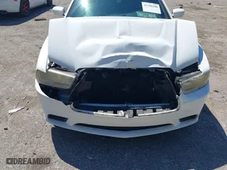2013 Dodge Charger SE with VIN 2C3CDXBG9DH705485, listed as a IAAI auction lot 41788288 with 134,751 mi miles. Bid and sale history available at carsss.com. Image 6.
