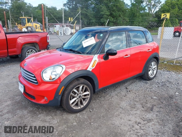 2012 MINI Countryman with VIN WMWZB3C57CWM06379, listed as a IAAI auction lot 42467193 with 100,485 mi miles and . Bid and sale history available at DreamBid. Image 2.