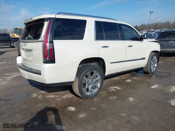 2015 Cadillac Escalade Luxury with VIN 1GYS4BKJ4FR245431, listed as a IAAI auction lot 41525919 with 120,429 mi miles. Bid and sale history available at carsss.com. Image 4.