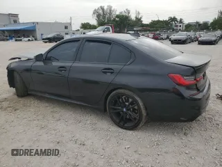 2020 BMW 3 Series M340i with VIN 3MW5U7J01L8B26649, listed as a Copart auction lot 62209814 with 49,731 mi miles and Salvage Title. Bid and sale history available at carsss.com. Image 2.