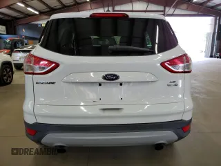 2013 Ford Escape SE z VIN 1FMCU9GX0DUD94201, wystawiony jako Copart lot #66153005 z przebiegiem 132 385 mil mil oraz Czysty tytuł • Clean title. Historia ofert i sprzedaży dostępna na DreamBid. Obrazek 6.