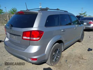 2019 Dodge Journey SE with VIN 3C4PDCBB7KT872524, listed as a IAAI auction lot 42093711 with 86,519 mi miles and . Bid and sale history available at DreamBid. Image 4.