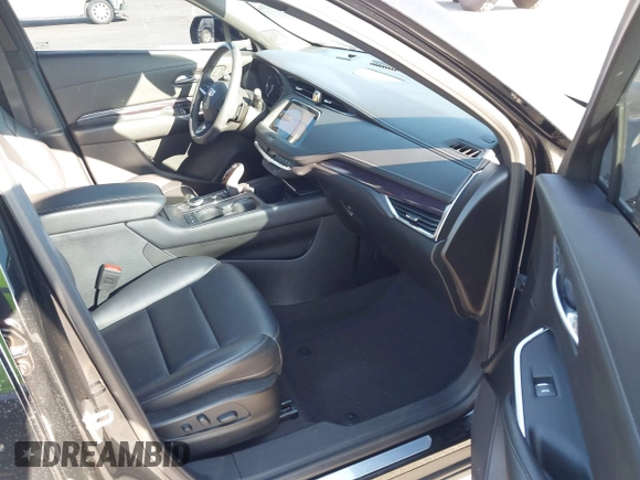 2021 Cadillac XT4 FWD Luxury with VIN 1GYAZAR46MF074767, listed as a IAAI auction lot 41652091 with 46,631 mi miles and . Bid and sale history available at DreamBid. Image 5.