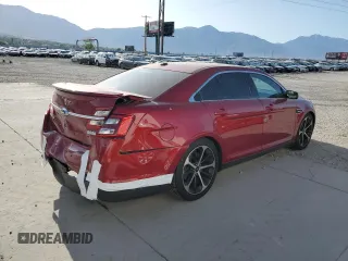 2014 Ford Taurus SHO with VIN 1FAHP2KT9EG115170, listed as a Copart auction lot 61203645 with 106,740 mi miles and Salvage title. Bid and sale history available at DreamBid. Image 3.