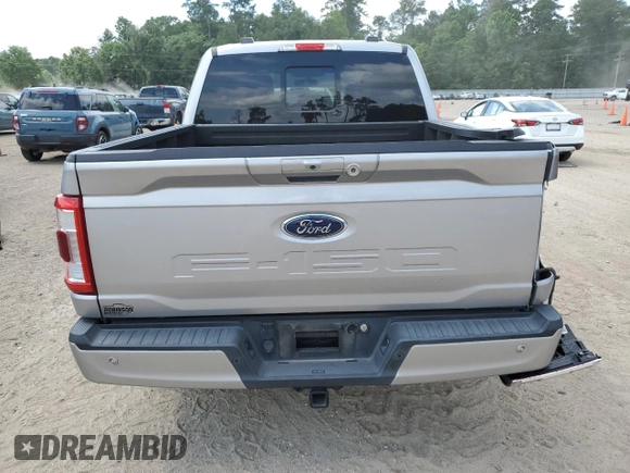 2021 Ford F-150 XL with VIN 1FTEW1C50MFA45654, listed as a Copart auction lot 56936595 with 103,189 mi miles and Salvage title. Bid and sale history available at DreamBid. Image 6.