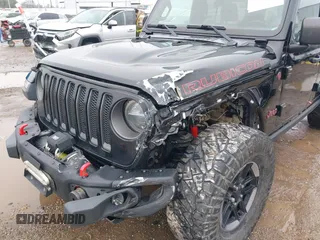 2019 Jeep Wrangler Unlimited Rubicon z VIN 1C4HJXFNXKW511193, wystawiony jako IAAI lot #41452579 z przebiegiem 91 857 mil mil oraz . Historia ofert i sprzedaży dostępna na DreamBid. Obrazek 6.