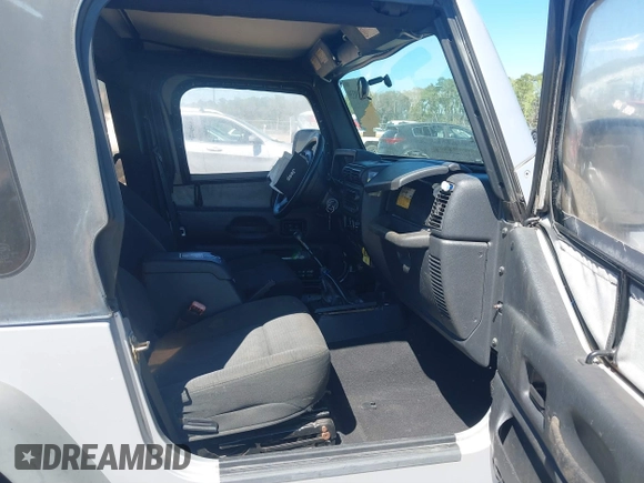 2006 Jeep Wrangler X with VIN 1J4FA39S86P743660, listed as a IAAI auction lot 41890339 with 198,099 mi miles and . Bid and sale history available at DreamBid. Image 5.