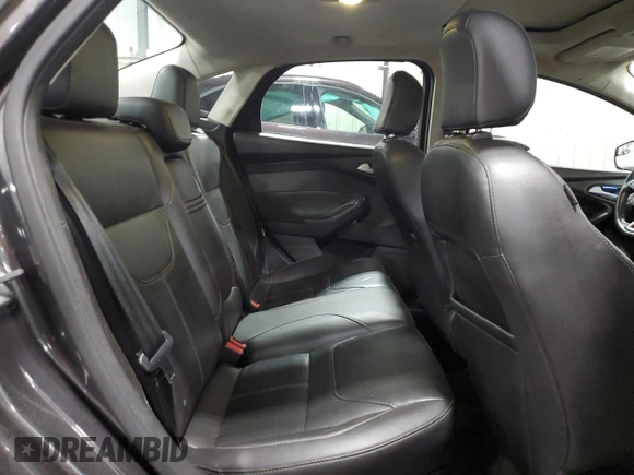 2016 Ford Focus SE z VIN 1FADP3F27GL216059, wystawiony jako Copart lot #59611395 z przebiegiem 170 468 mil mil oraz Szkoda całkowita • Salvage title. Historia ofert i sprzedaży dostępna na DreamBid. Obrazek 10.