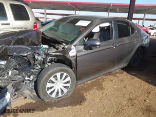 2021 Toyota Camry Hybrid LE with VIN 4T1C31AK7MU551689, listed as a IAAI auction lot 41469776 with 1 mi miles. Bid and sale history available at carsss.com. Image 2.