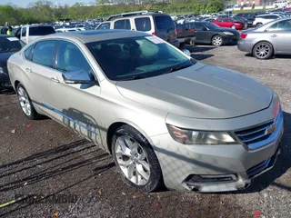 2014 Chevrolet Impala LTZ with VIN 2G1155S3XE9309815, listed as a IAAI auction lot 42039143 with 201,625 mi miles and . Bid and sale history available at DreamBid. Image 1.