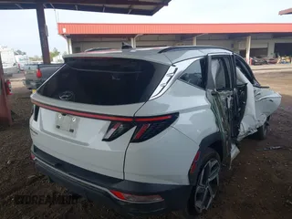 2022 Hyundai Tucson SEL with VIN 5NMJC3AE6NH060475, listed as a IAAI auction lot 41808281 with 94,694 mi miles and . Bid and sale history available at DreamBid. Image 4.