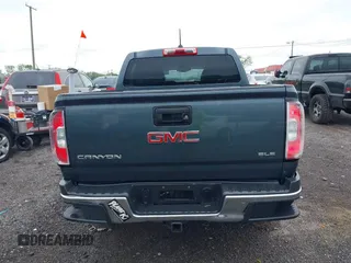 2015 GMC Canyon 4WD SLE with VIN 1GTG6BE3XF1153421, listed as a IAAI auction lot 42079375 with 161,379 mi miles and . Bid and sale history available at carsss.com. Image 16.