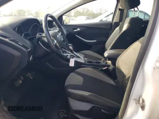 2012 Ford Focus SE with VIN 1FAHP3F27CL182474, listed as a Copart auction lot 51451595 with 122,199 mi miles and Salvage Title. Bid and sale history available at DreamBid. Image 7.