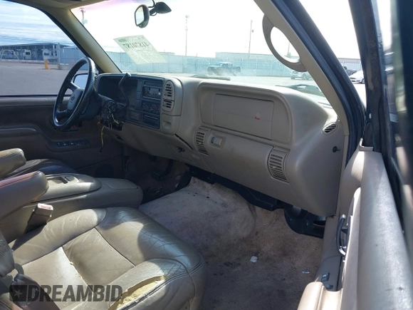 1999 GMC Yukon with VIN 1GKEK13R3XJ717999, listed as a IAAI auction lot 41870187 with 179,855 mi miles. Bid and sale history available at carsss.com. Image 5.