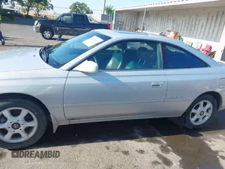 2001 Toyota Solara SE z VIN 2T1CF28P91C491927, wystawiony jako IAAI lot #42475651 z przebiegiem 142 628 mil mil oraz . Historia ofert i sprzedaży dostępna na DreamBid. Obrazek 15.