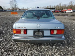 1986 Mercedes-Benz 300 with VIN WDBCB25D9GA279756, listed as a Copart auction lot 46860345 with 210,386 mi miles and Salvage Title. Bid and sale history available at carsss.com. Image 6.