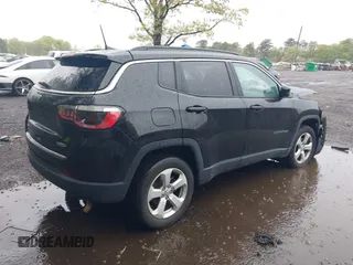 2021 Jeep Compass Latitude with VIN 3C4NJDBB4MT506951, listed as a IAAI auction lot 42183491 with 50,193 mi miles and . Bid and sale history available at DreamBid. Image 4.