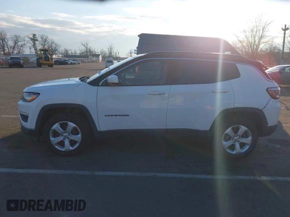 2019 Jeep Compass Latitude with VIN 3C4NJDBB4KT714079, listed as a IAAI auction lot 41317866 with 76,601 mi miles and . Bid and sale history available at DreamBid. Image 13.
