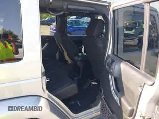 2015 Jeep Wrangler Unlimited Sahara with VIN 1C4BJWEG9FL570780, listed as a IAAI auction lot 42474940 with 116,226 mi miles and . Bid and sale history available at DreamBid. Image 8.