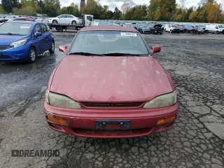 1995 Toyota Camry LE with VIN JT2GK12E6S0102213, listed as a Copart auction lot 77935474 with 166,844 mi miles and Clean Title. Bid and sale history available at carsss.com. Image 5.