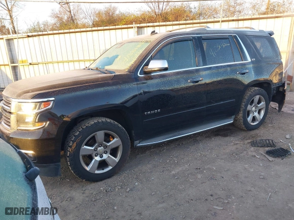 2015 Chevrolet Tahoe LTZ with VIN 1GNSKCKC2FR106098, listed as a IAAI auction lot 41031110 with 167,172 mi miles. Bid and sale history available at carsss.com. Image 17.