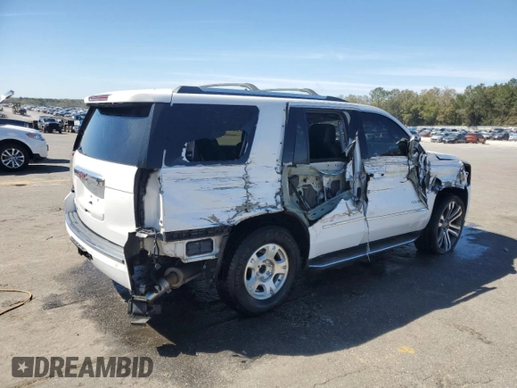 2015 GMC Yukon Denali with VIN 1GKS1CKJ9FR566390, listed as a Copart auction lot 48472835 with 167,719 mi miles and Salvage Title. Bid and sale history available at carsss.com. Image 3.