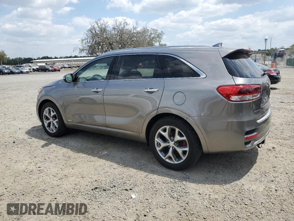 2016 Kia Sorento SX z VIN 5XYPKDA52GG141330, wystawiony jako Copart lot #55448425 z przebiegiem 78 330 mil mil oraz Szkoda całkowita • Salvage title. Historia ofert i sprzedaży dostępna na DreamBid. Obrazek 2.