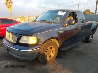 1999 Ford F-150 XL with VIN 1FTRX17L3XKB32547, listed as a IAAI auction lot 41331882 with Not Provided miles. Bid and sale history available at carsss.com. Image 18.