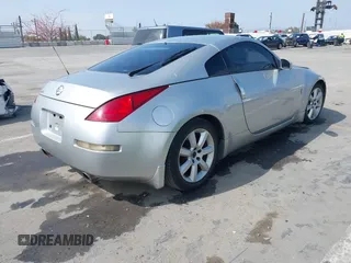 2003 Nissan 350Z Touring with VIN JN1AZ34E93T021887, listed as a IAAI auction lot 42104680 with 152,853 mi miles. Bid and sale history available at carsss.com. Image 4.